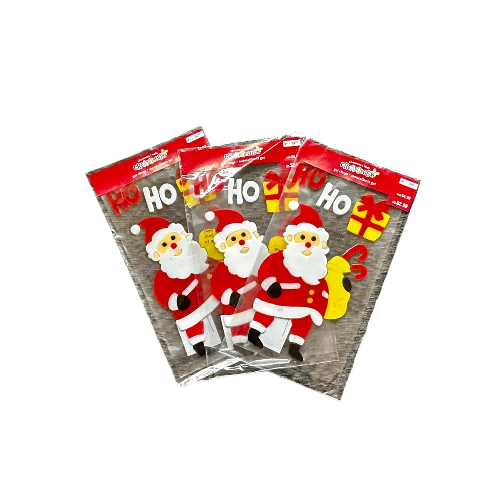 NWT three Santa Claus gel clings